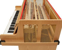 Inside a Schiedmayer celesta in natural oak, showing the action and resonators